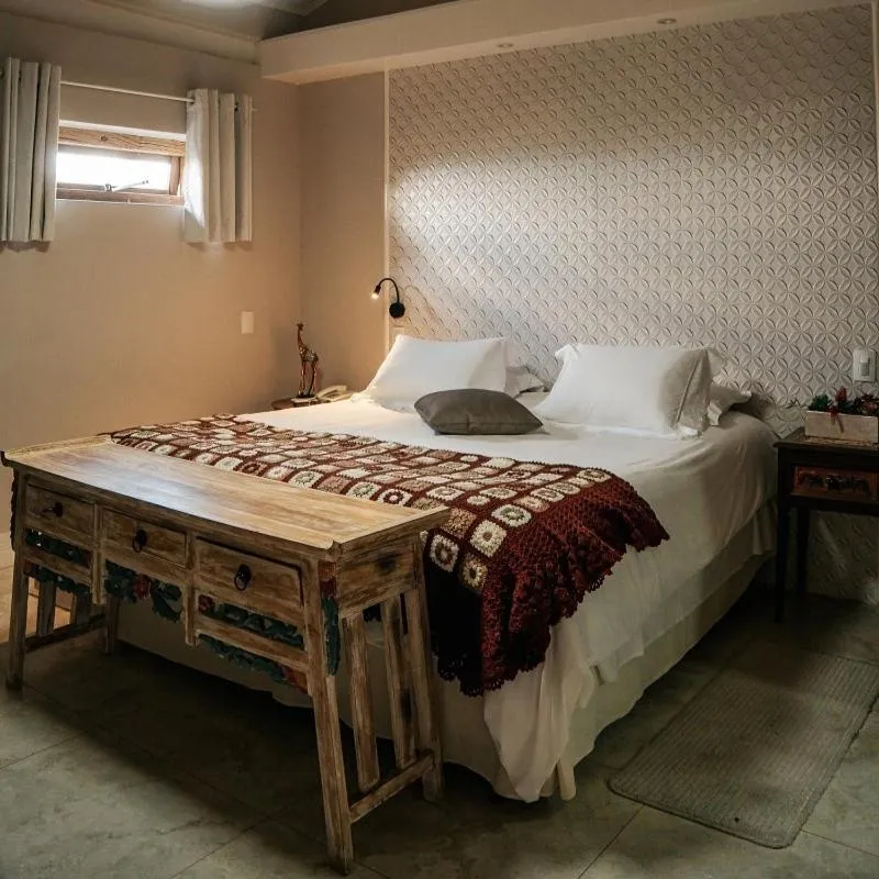 Bed in Hotel Pousada Shangri-la