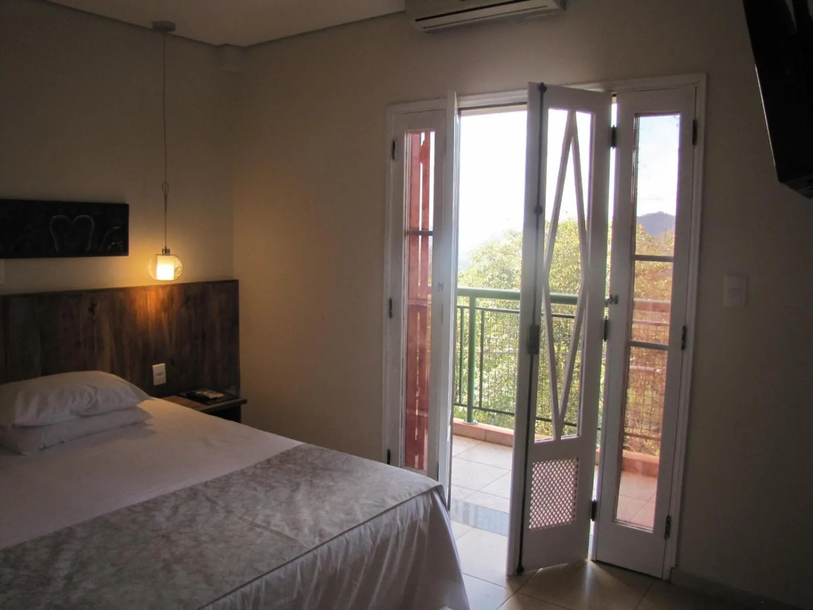 Bed in Hotel Pousada Shangri-la