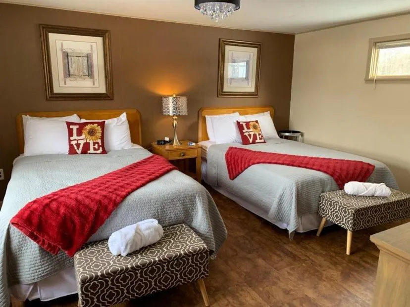 Bed in Starlight Lodge at Rockport Harbor
