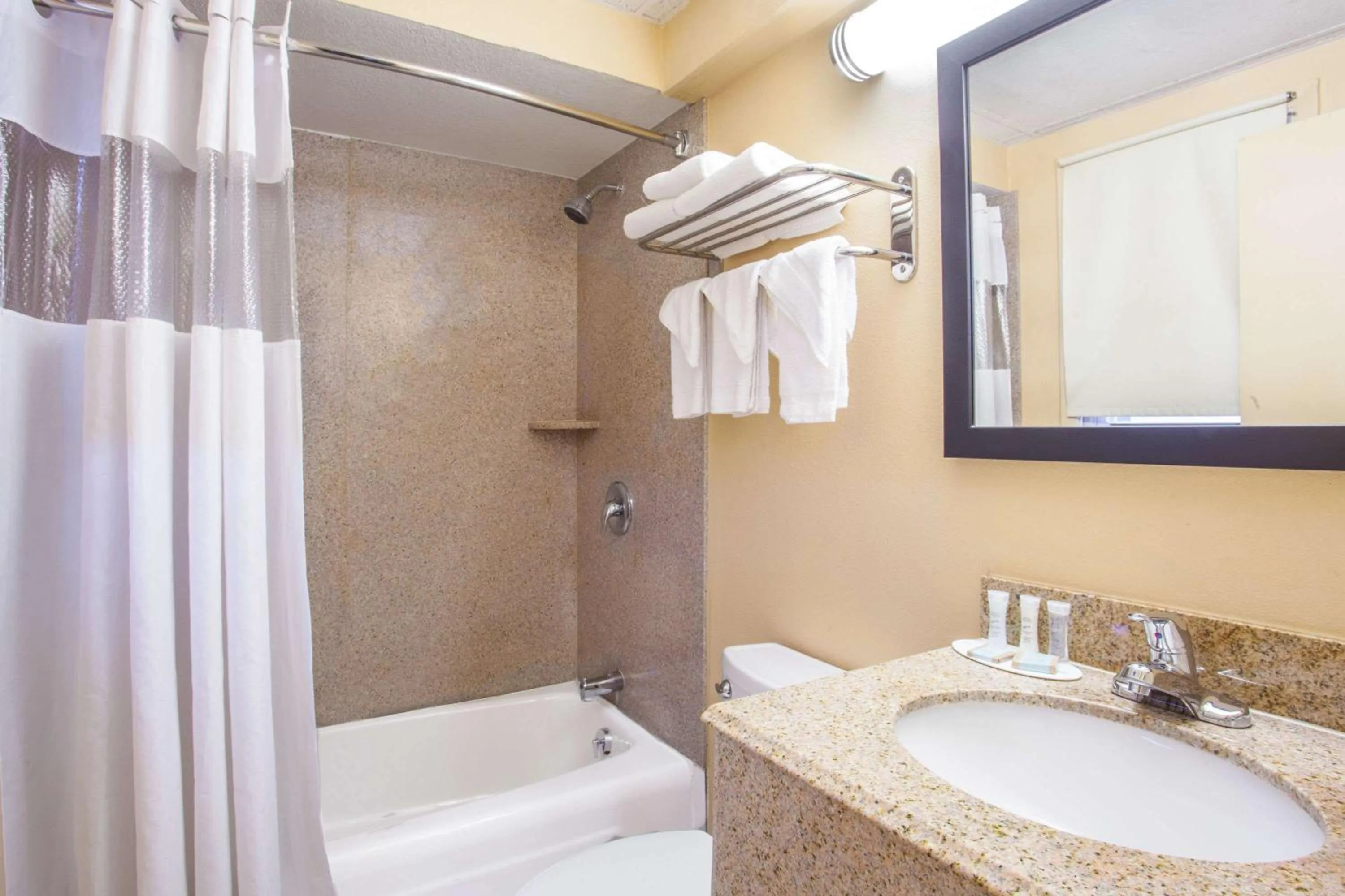 Bathroom in Travelodge by Wyndham South Burlington