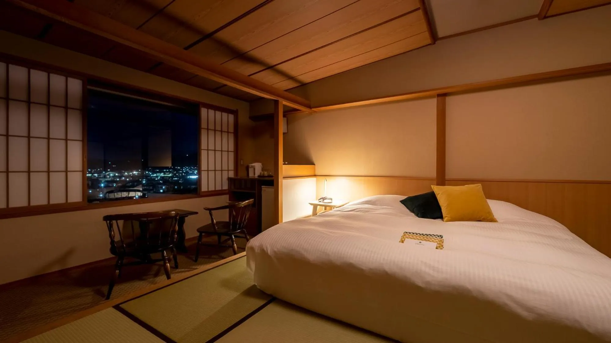 Bed in onsen hotel OMOTO