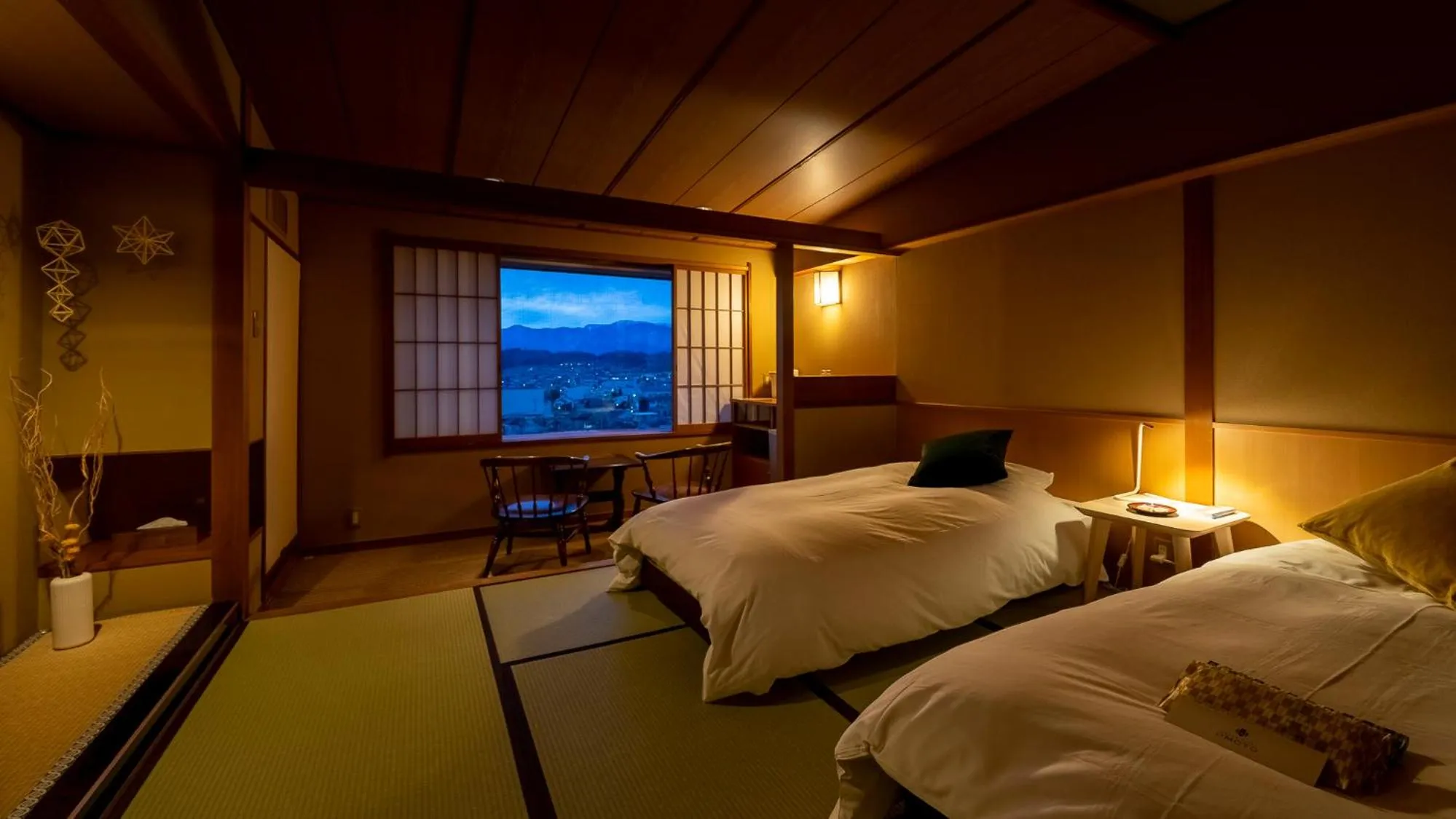 Bed in onsen hotel OMOTO