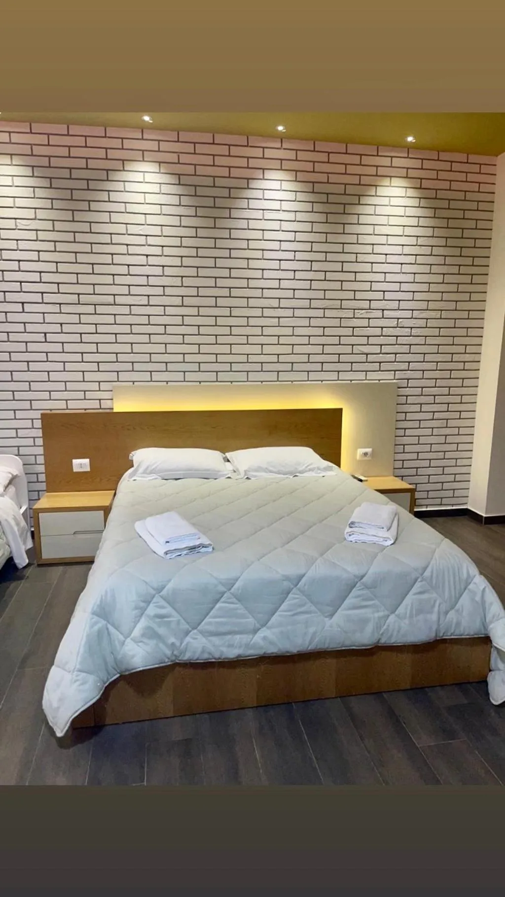 Bed in Sunrise Luxury Apartments