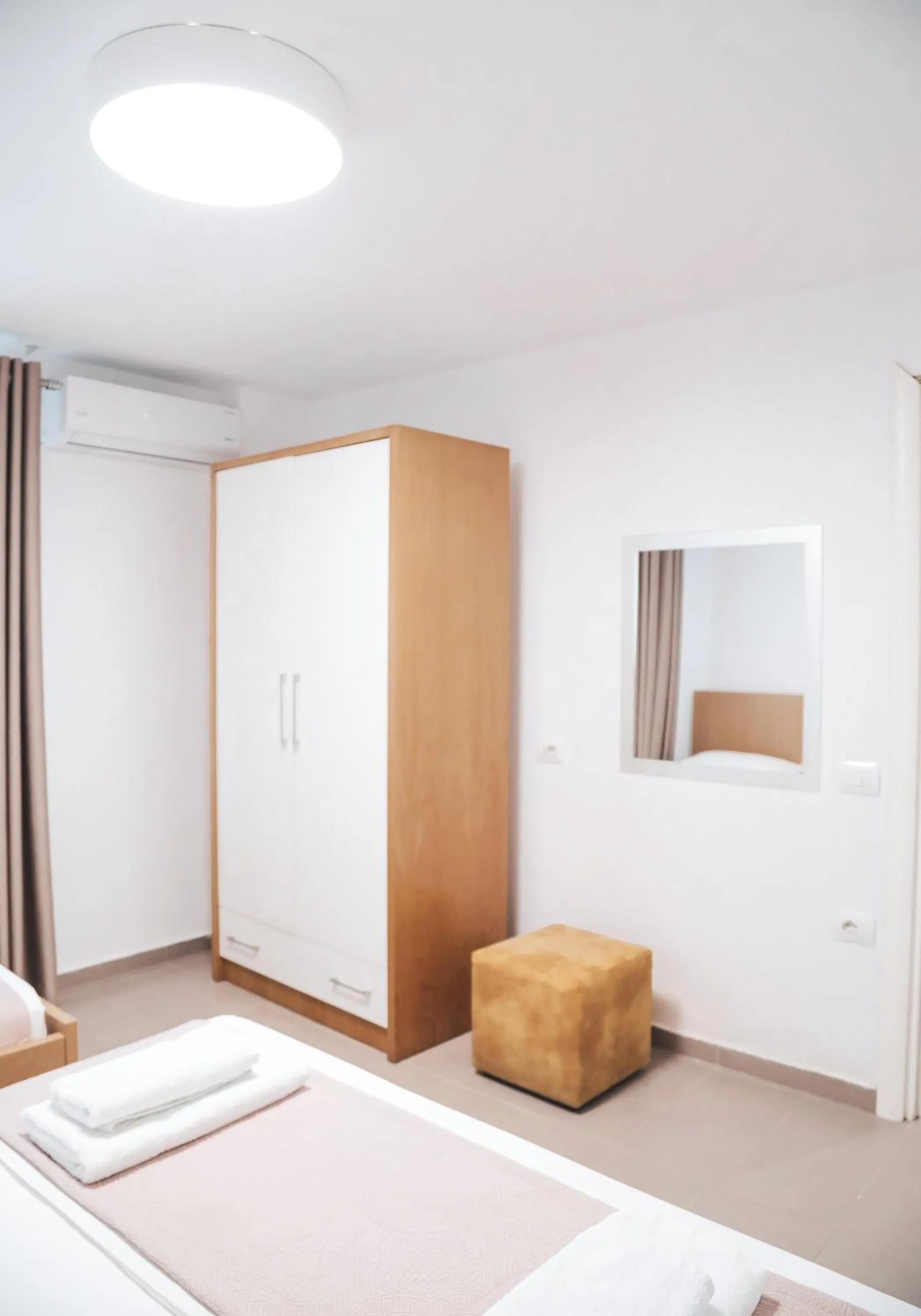 Bed in Sunrise Luxury Apartments