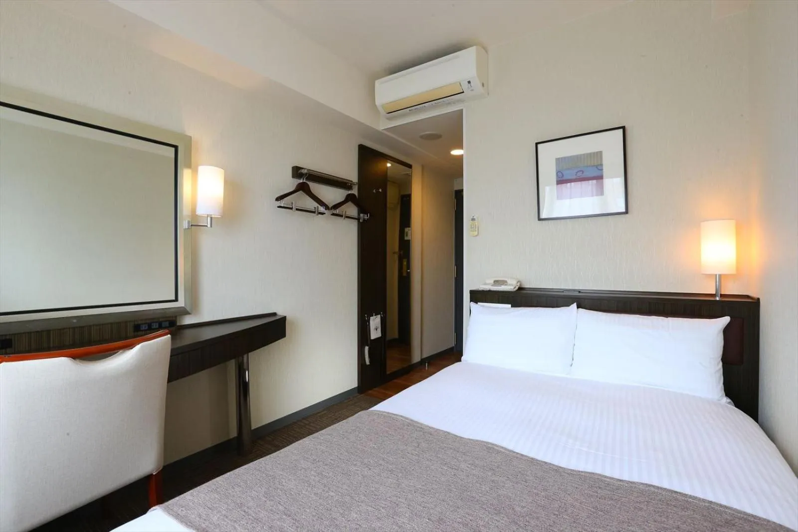 Bed in Hotel Hokke Club Niigata Nagaoka