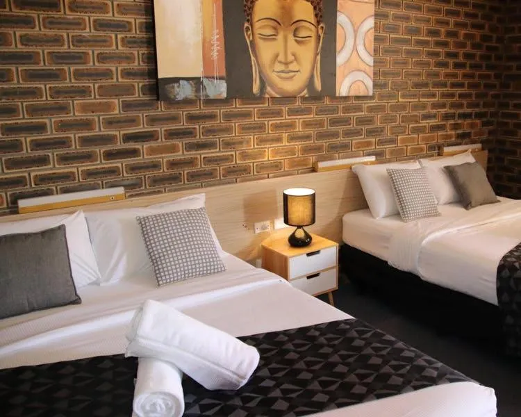 Bed in Squatters Homestead Motel