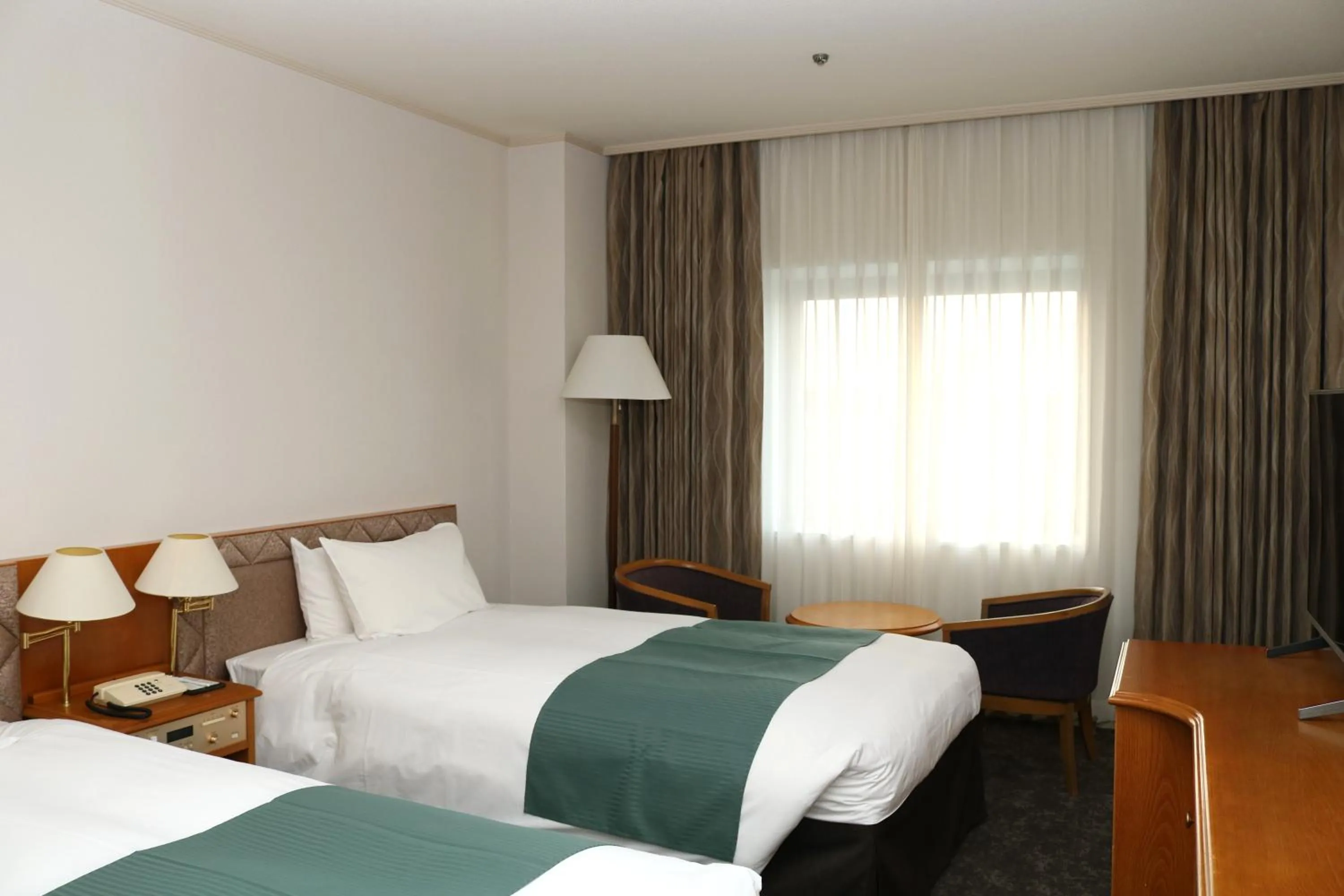 Photo of the whole room, Bed in Hotel New Otani Tottori