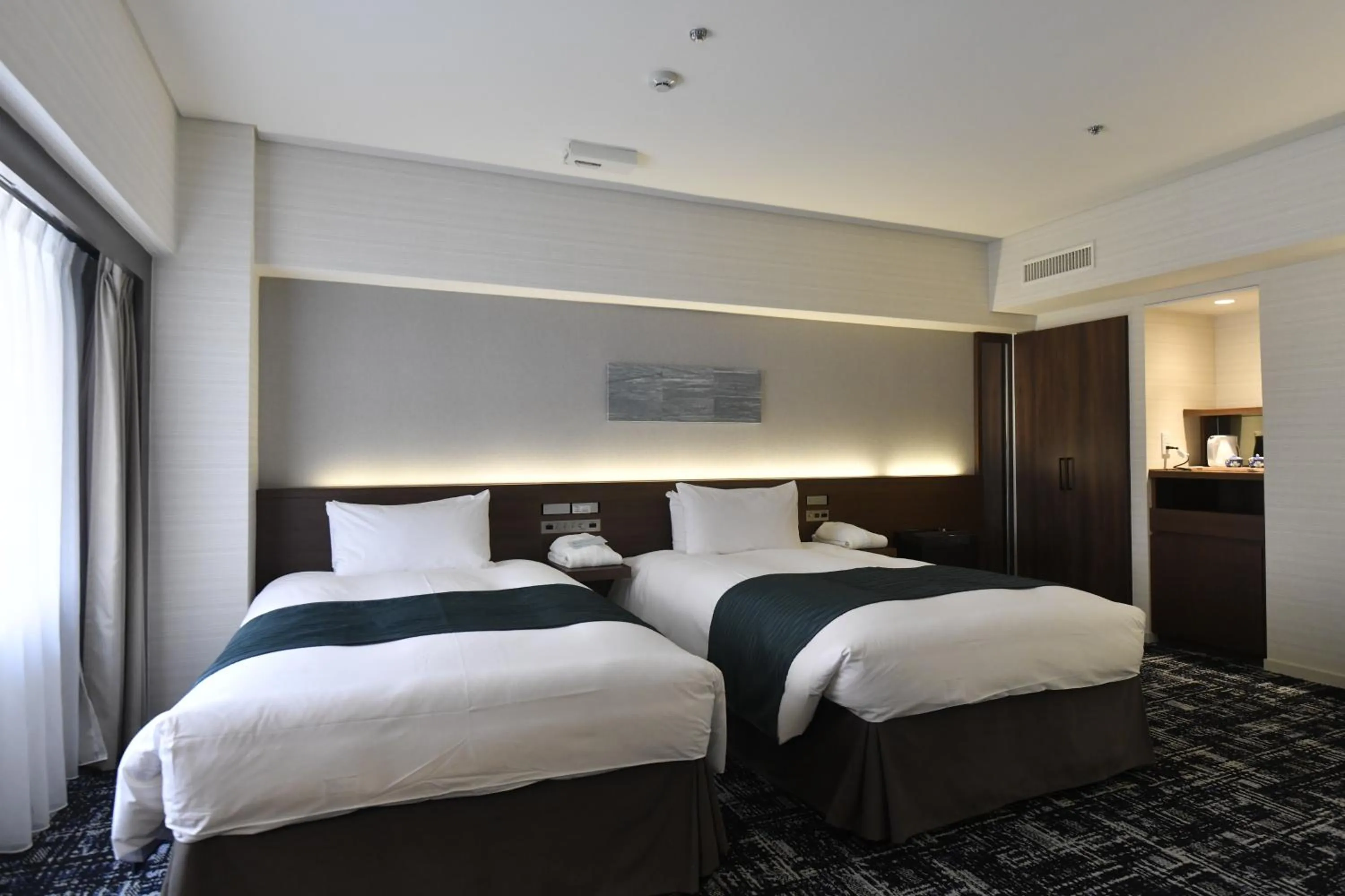 Photo of the whole room, Bed in Hotel New Otani Tottori