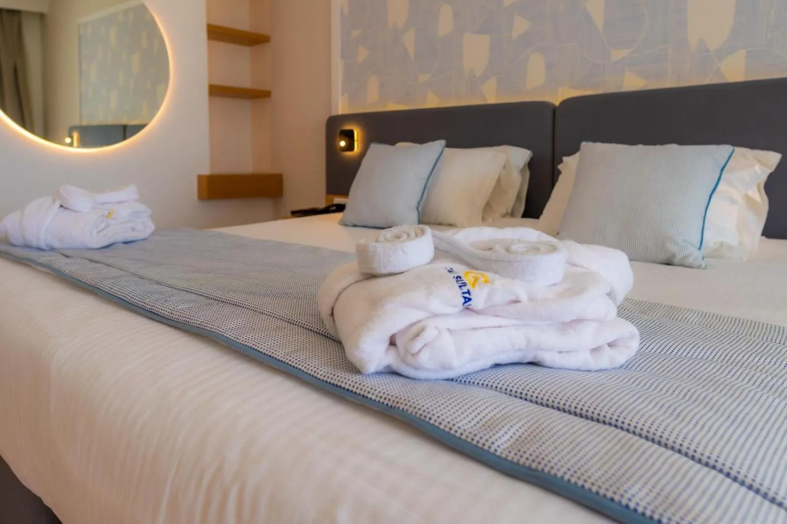 Bed in Royal Tulip Taj Sultan