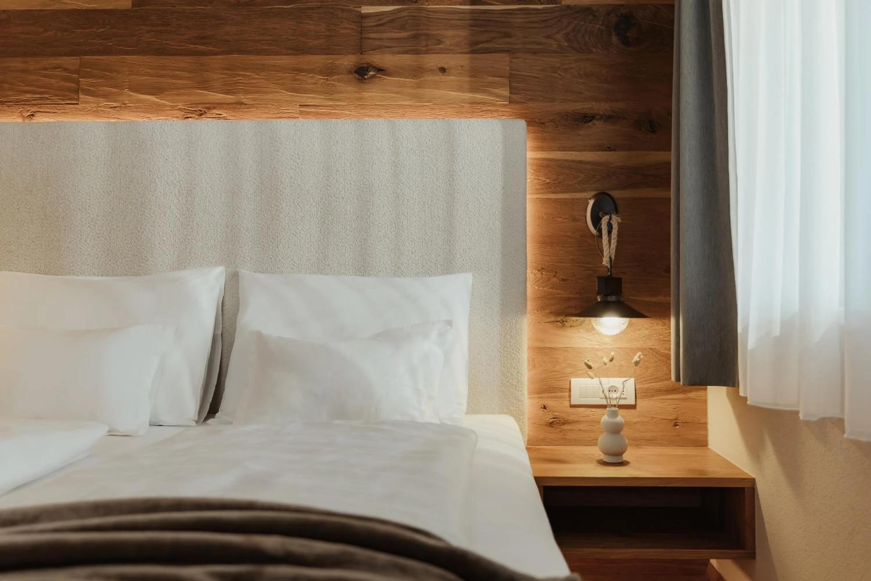 Bed in Hotel B&B Feldmessner