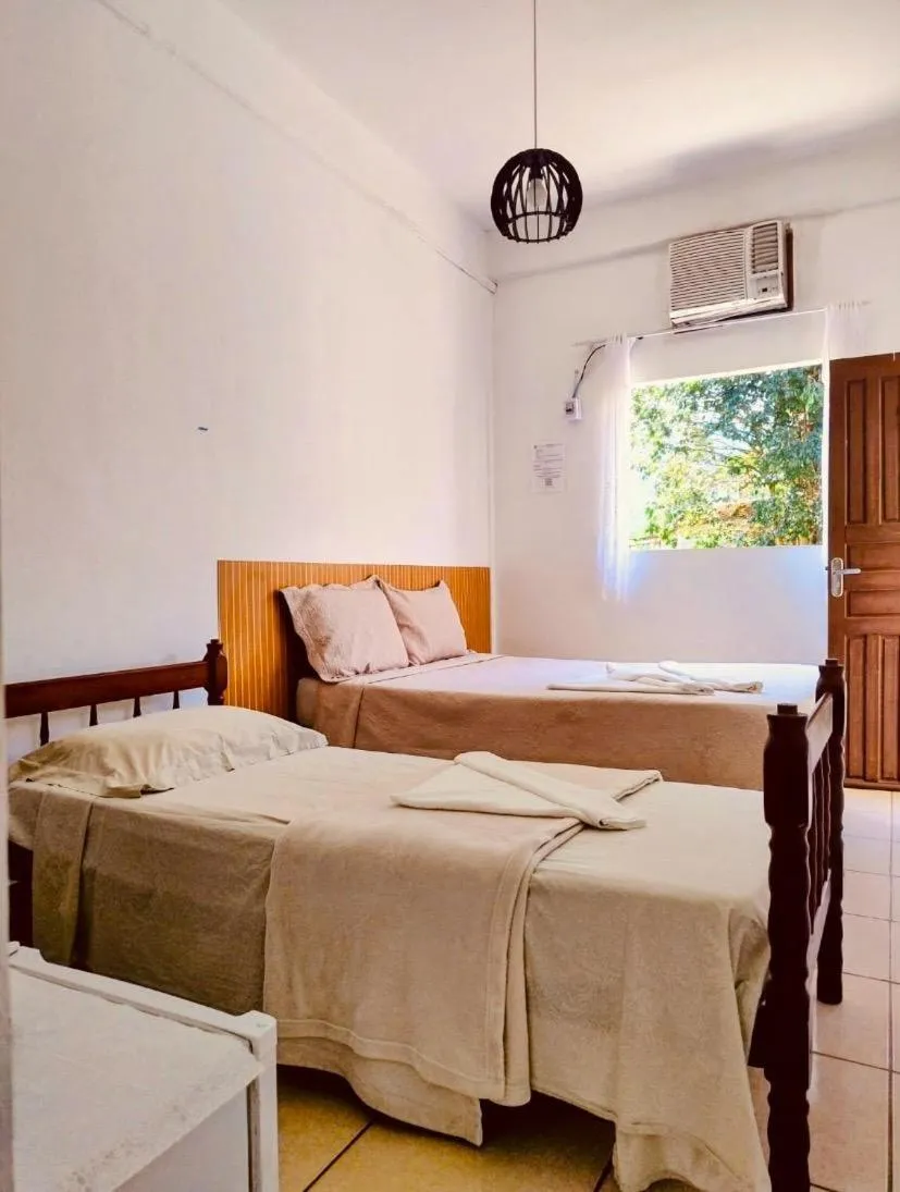 Bed in Pousada Cantinho do Sossego localizada do lado Norte de Paraty próxima as Praias de Sao Gonçalo São Gonçalinho Aldeia dos Pataxós Cachoeira do Crepusculo Ilha do Pelad e muito mais