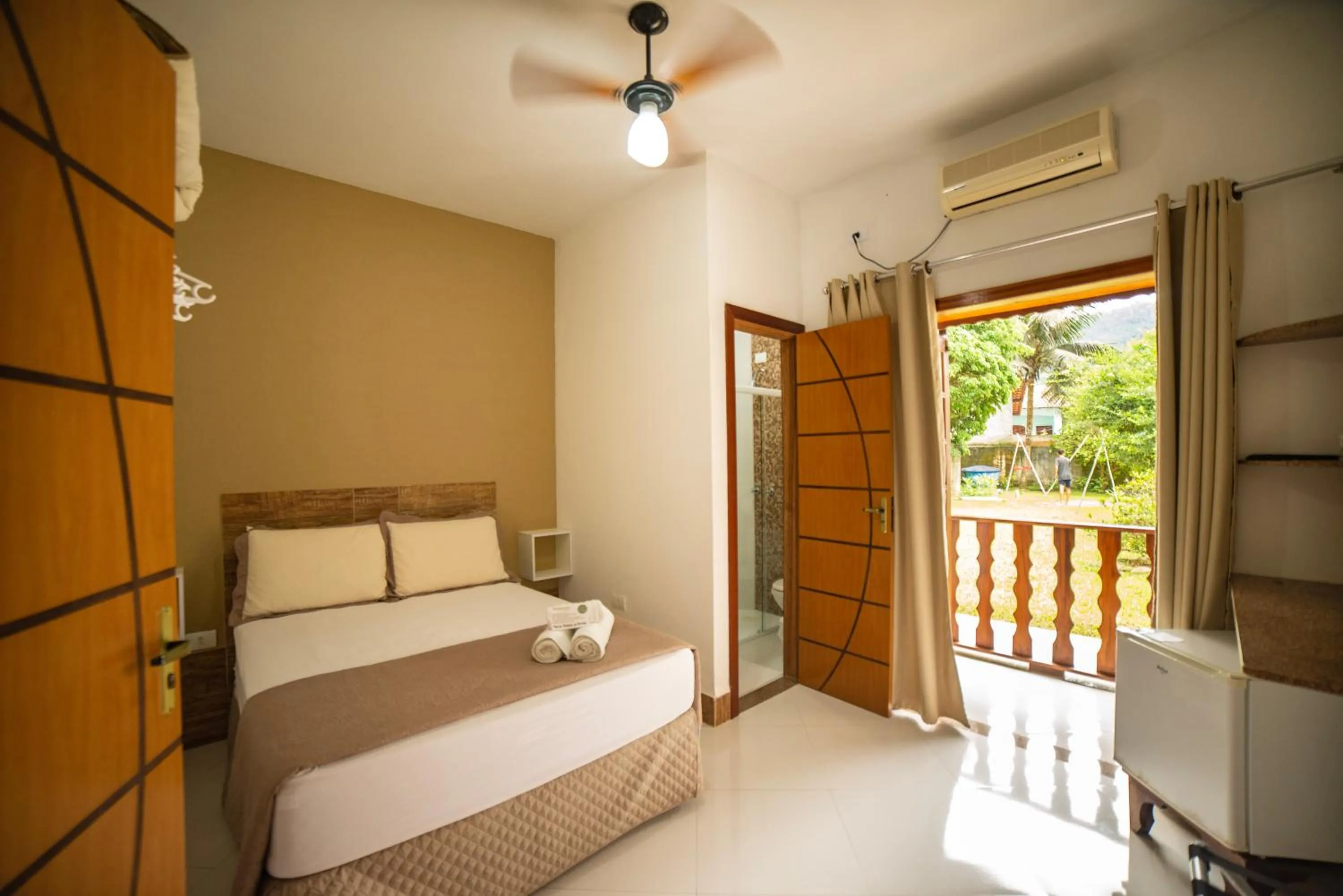 Bed in Pousada Cantinho do Sossego localizada do lado Norte de Paraty próxima as Praias de Sao Gonçalo São Gonçalinho Aldeia dos Pataxós Cachoeira do Crepusculo Ilha do Pelad e muito mais