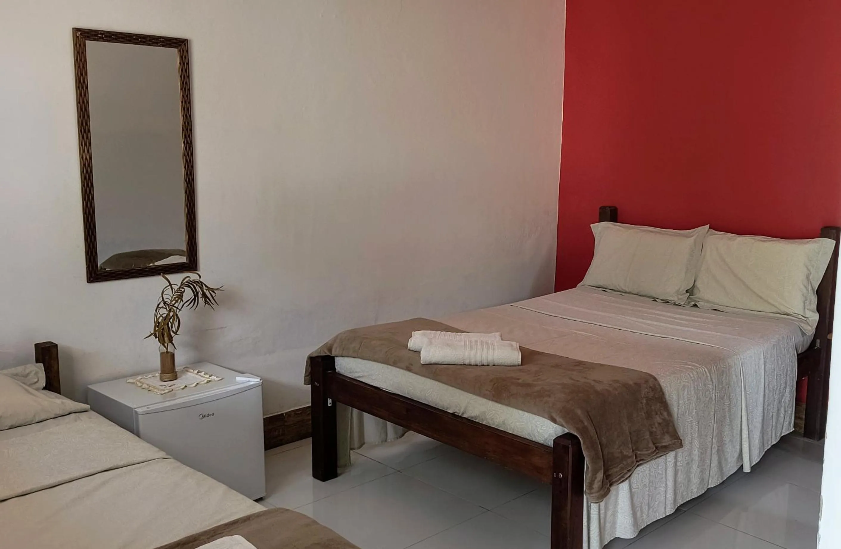 Bed in Pousada Cantinho do Sossego localizada do lado Norte de Paraty próxima as Praias de Sao Gonçalo São Gonçalinho Aldeia dos Pataxós Cachoeira do Crepusculo Ilha do Pelad e muito mais