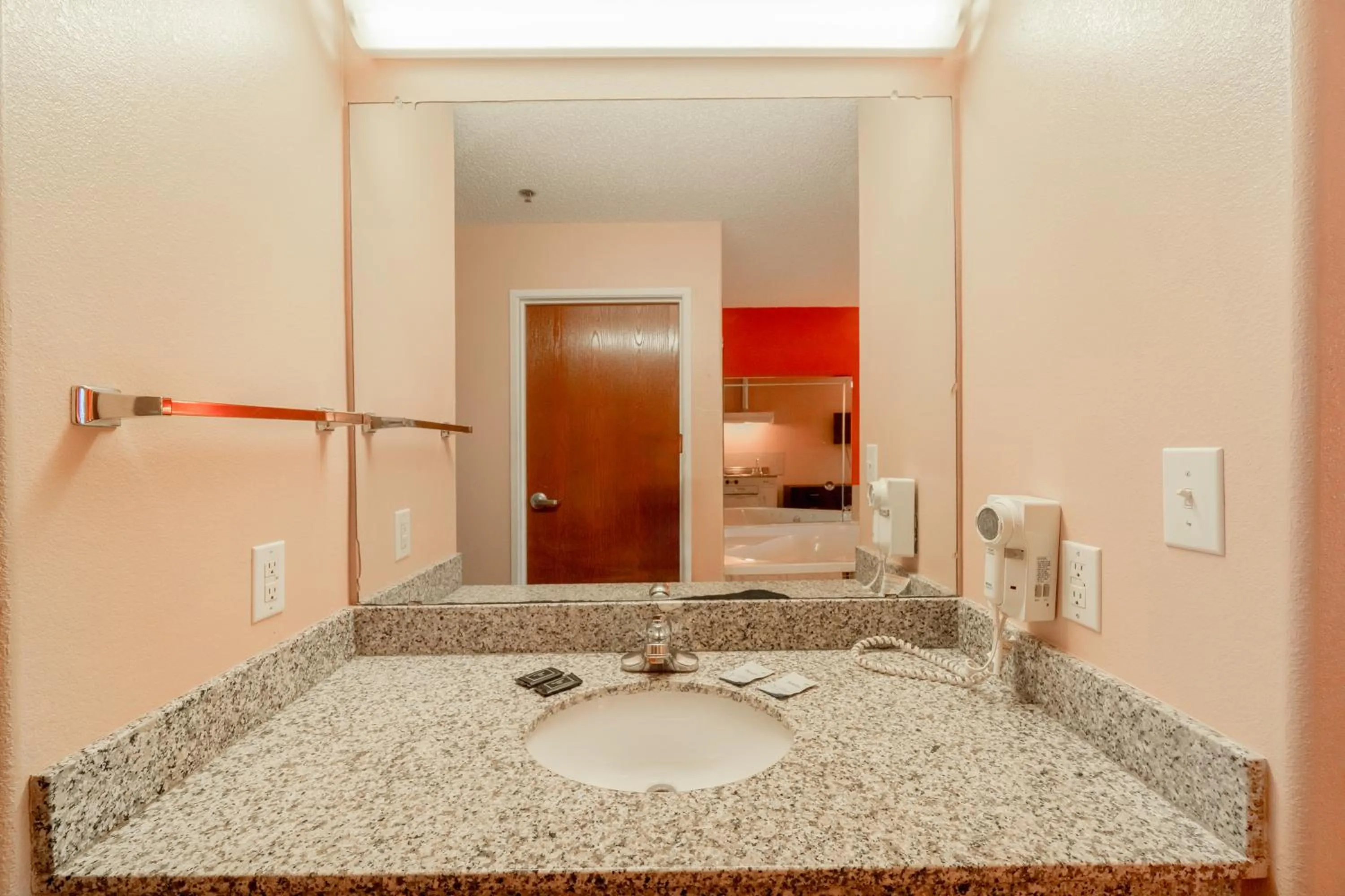 Bathroom in Capital O Fairway Inn - Baytown La Porte TX