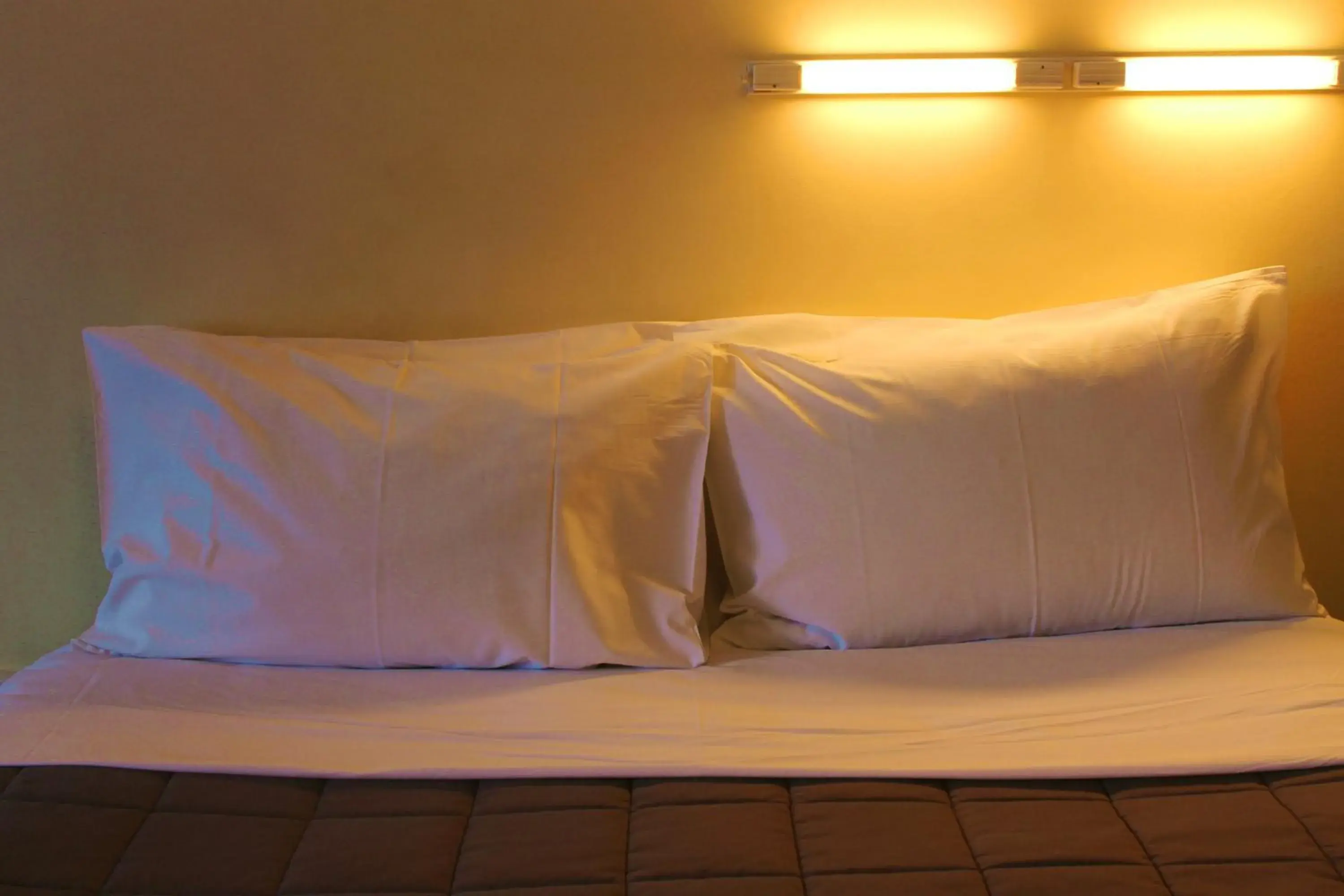 Bed in Ferry Motel