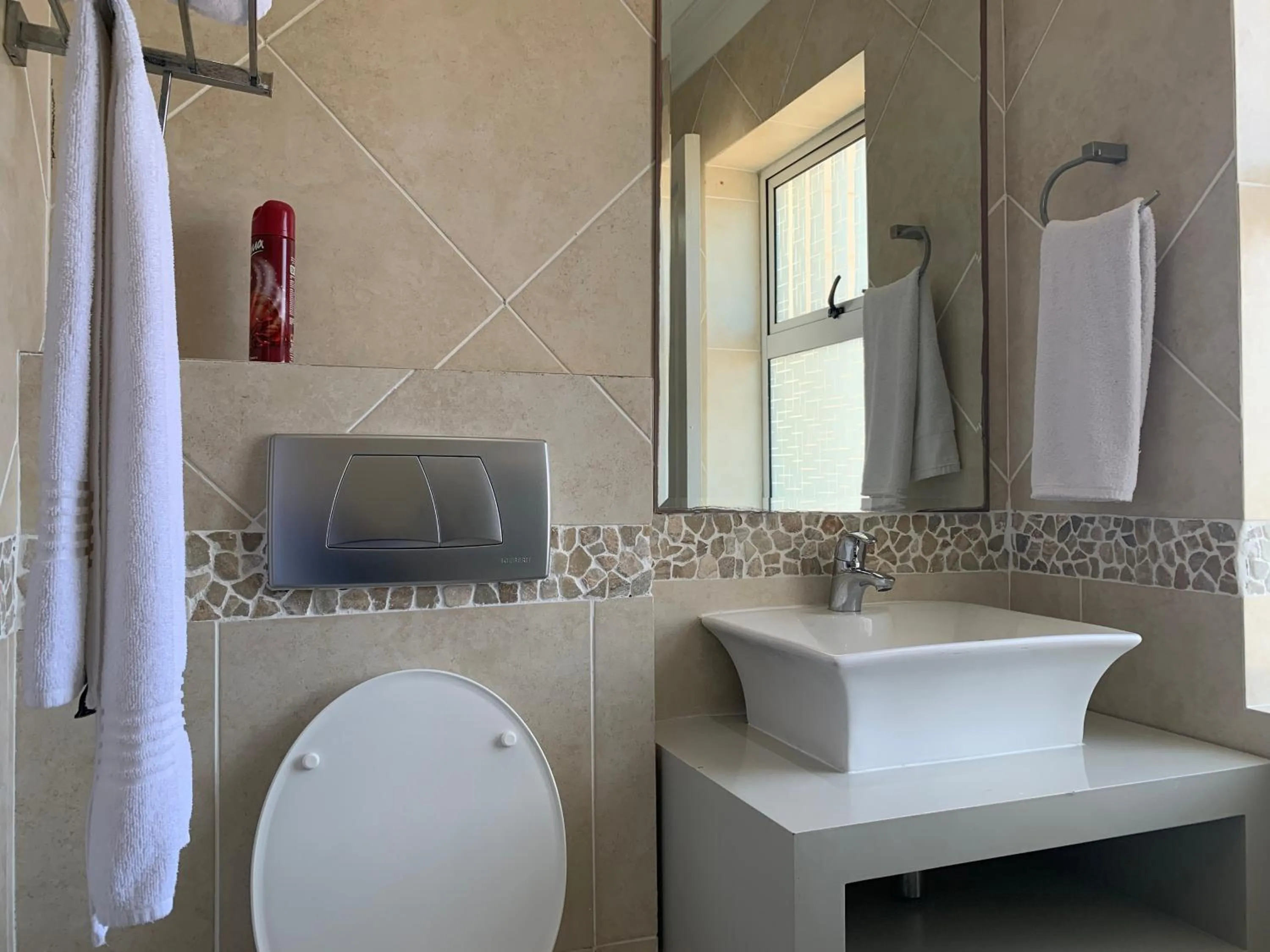 Toilet in Oceansnest Guest House