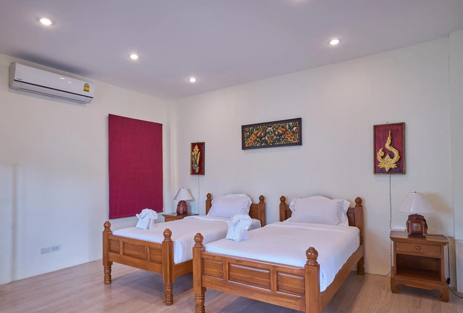 Bed in Mina Garden Villa Resort