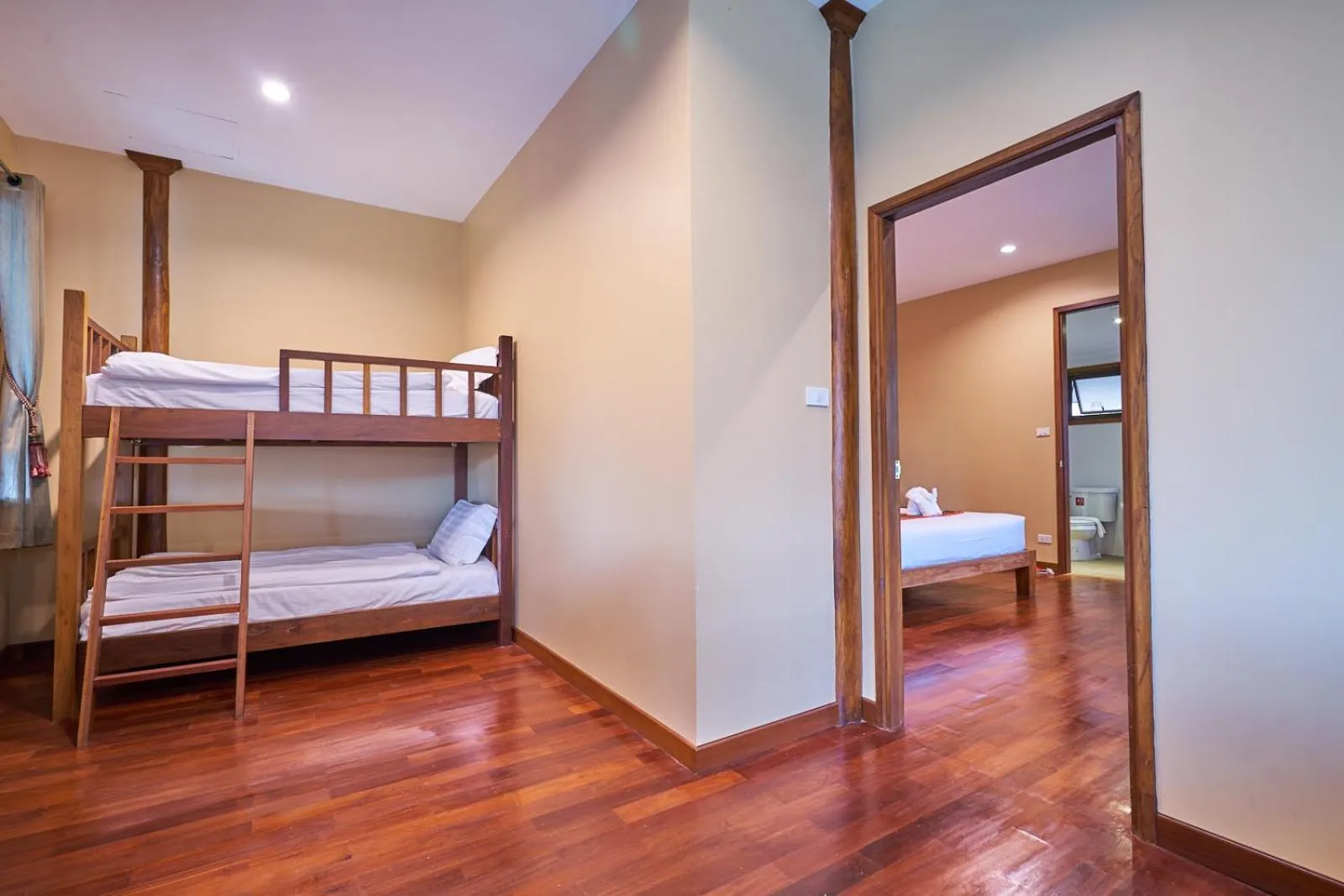 Bed in Mina Garden Villa Resort