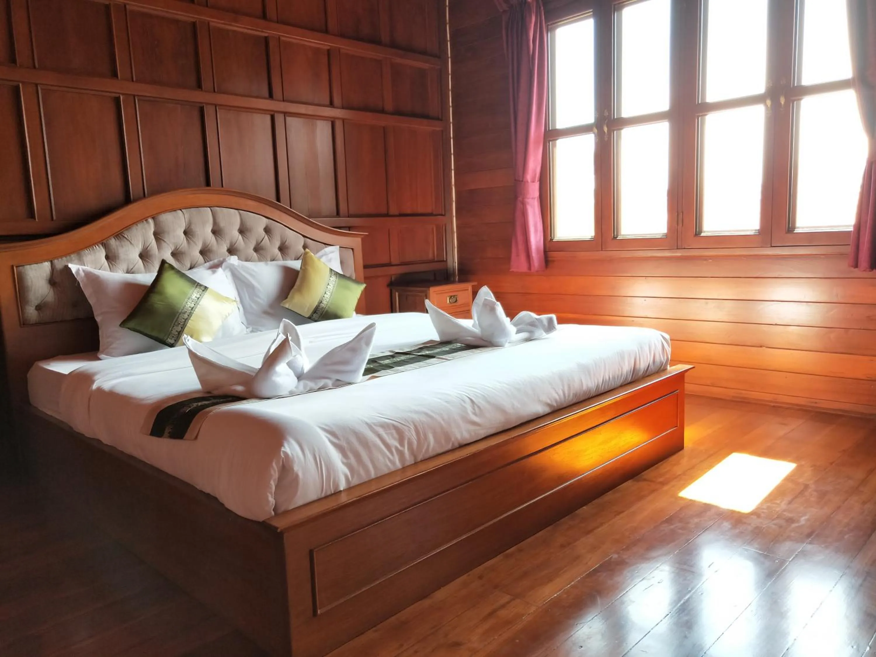 Bed in Mina Garden Villa Resort