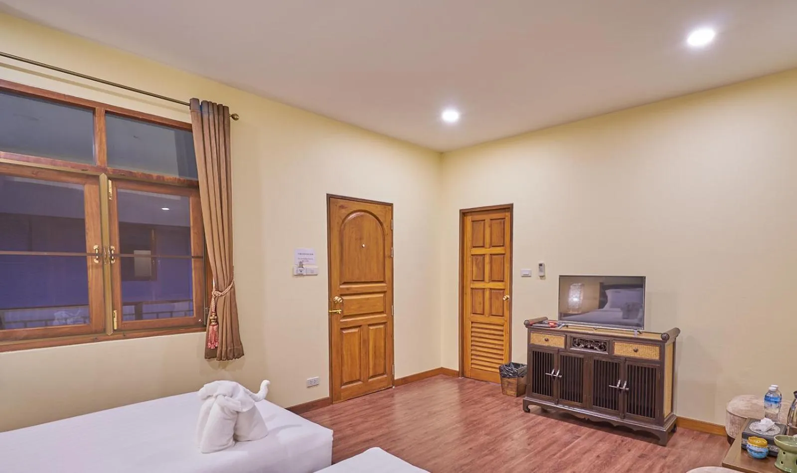 Bed in Mina Garden Villa Resort