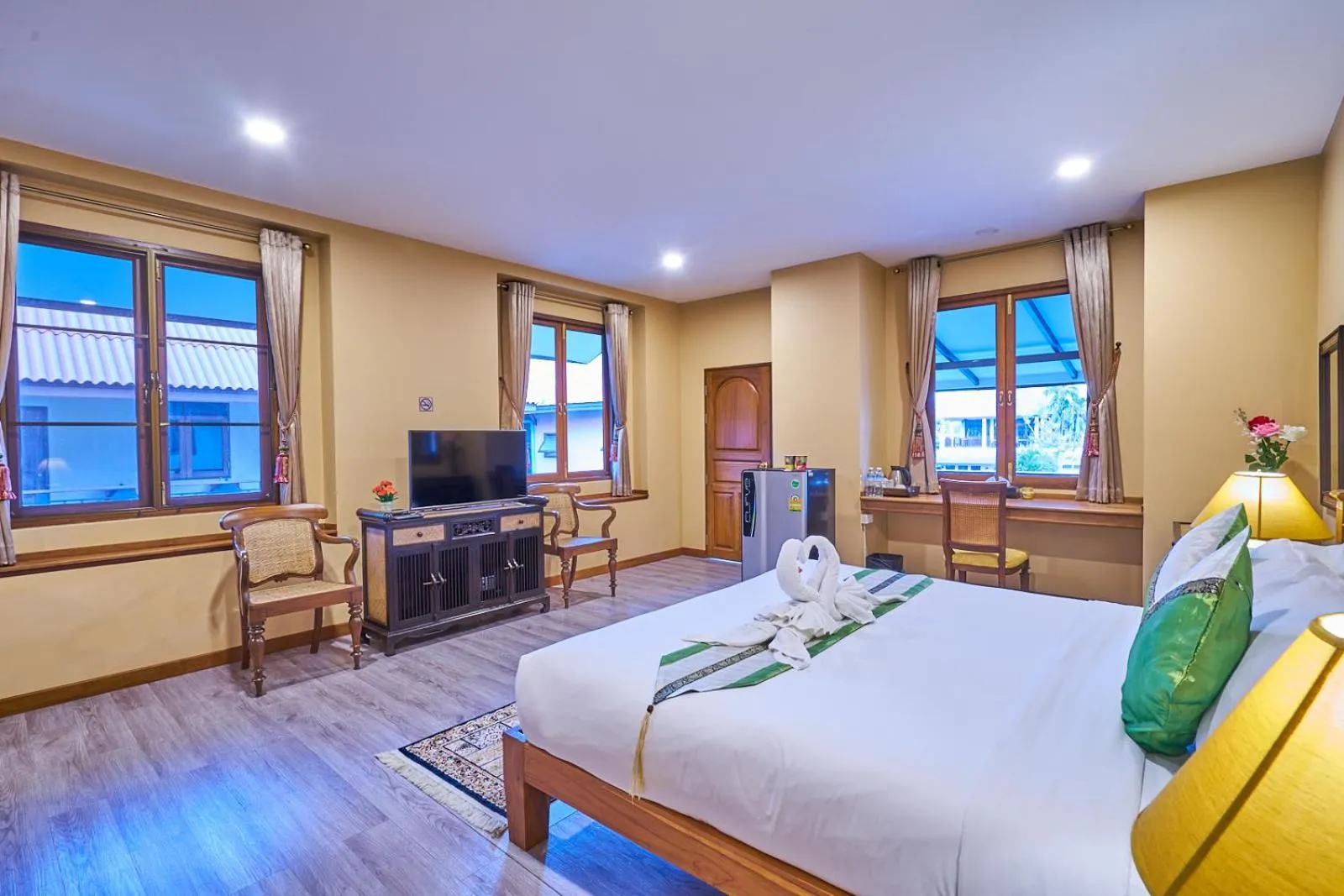 Bed in Mina Garden Villa Resort