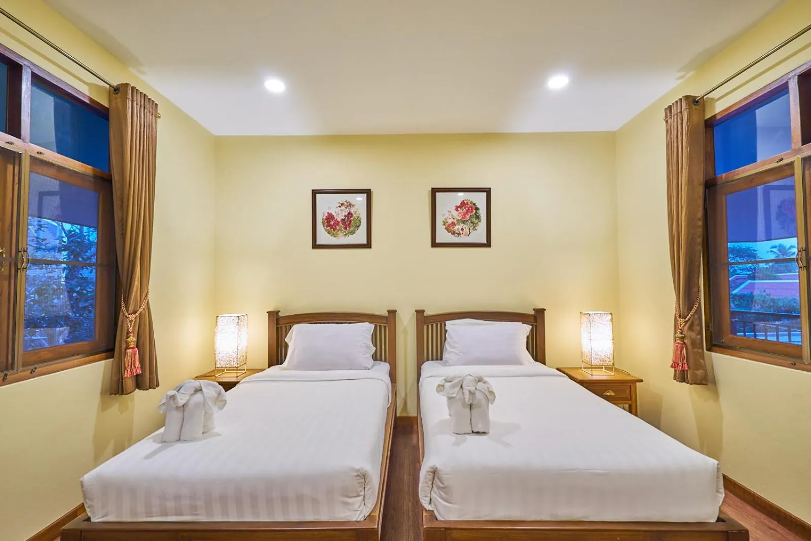 Bed in Mina Garden Villa Resort