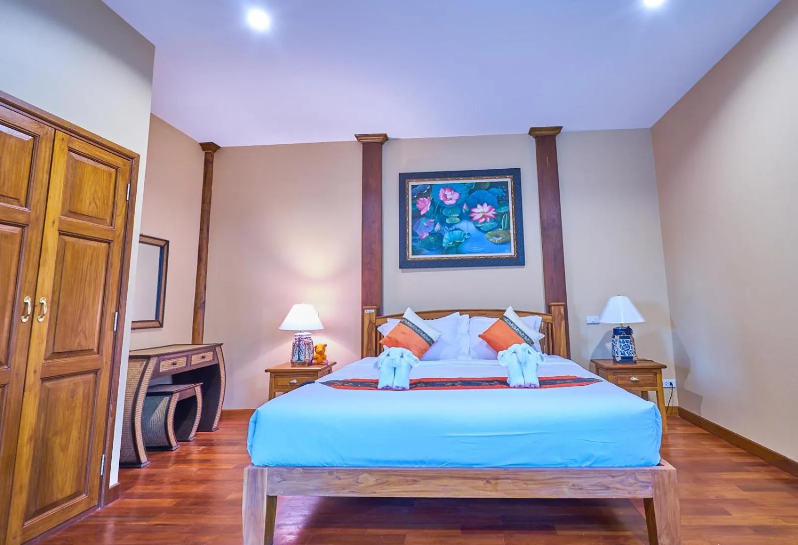 Bed in Mina Garden Villa Resort