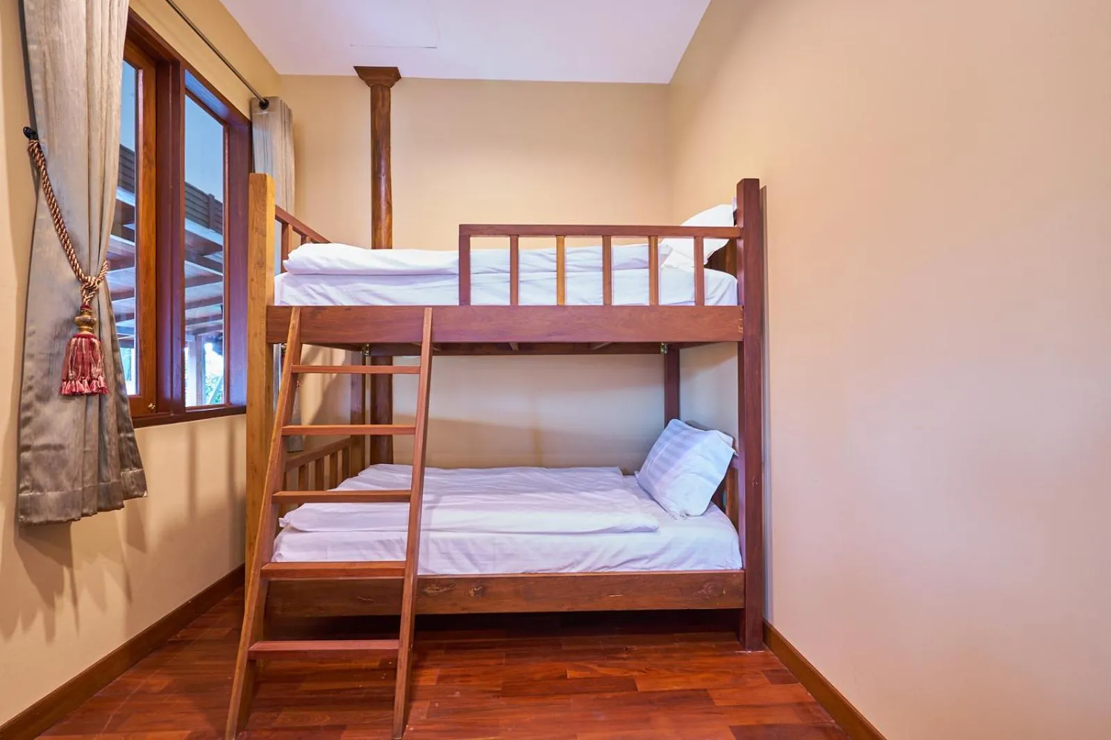 Bed in Mina Garden Villa Resort