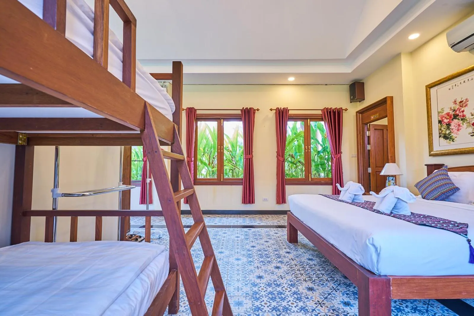 Bed in Mina Garden Villa Resort