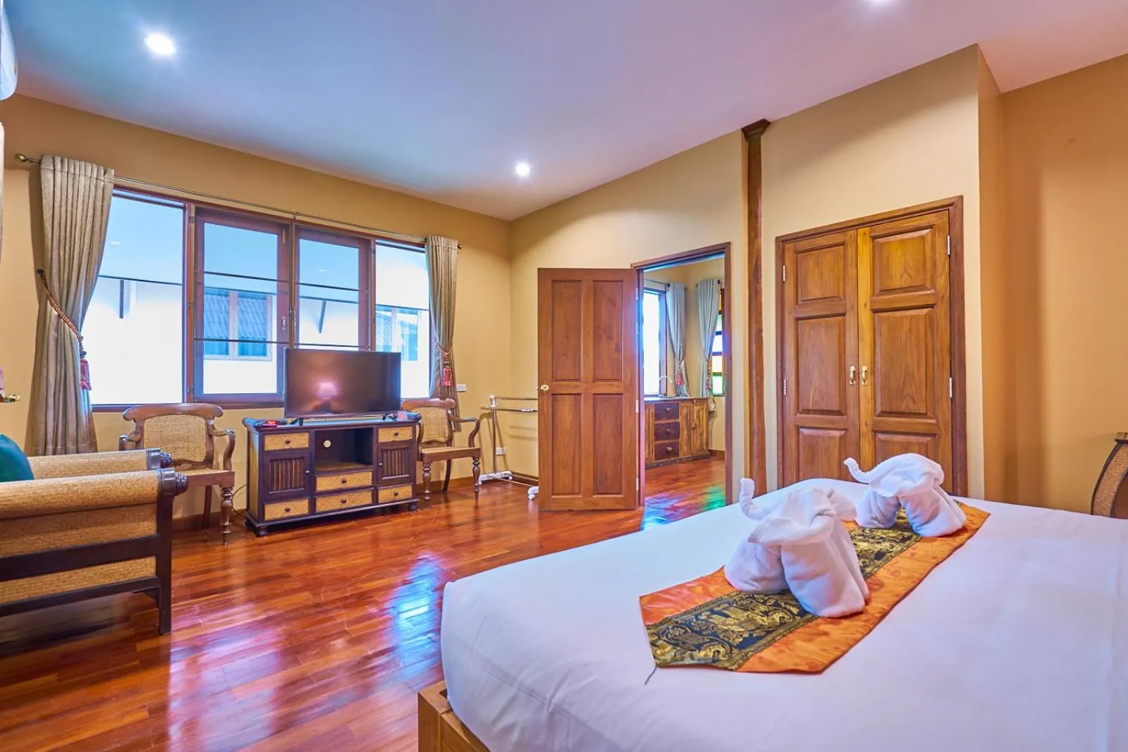 Bed in Mina Garden Villa Resort