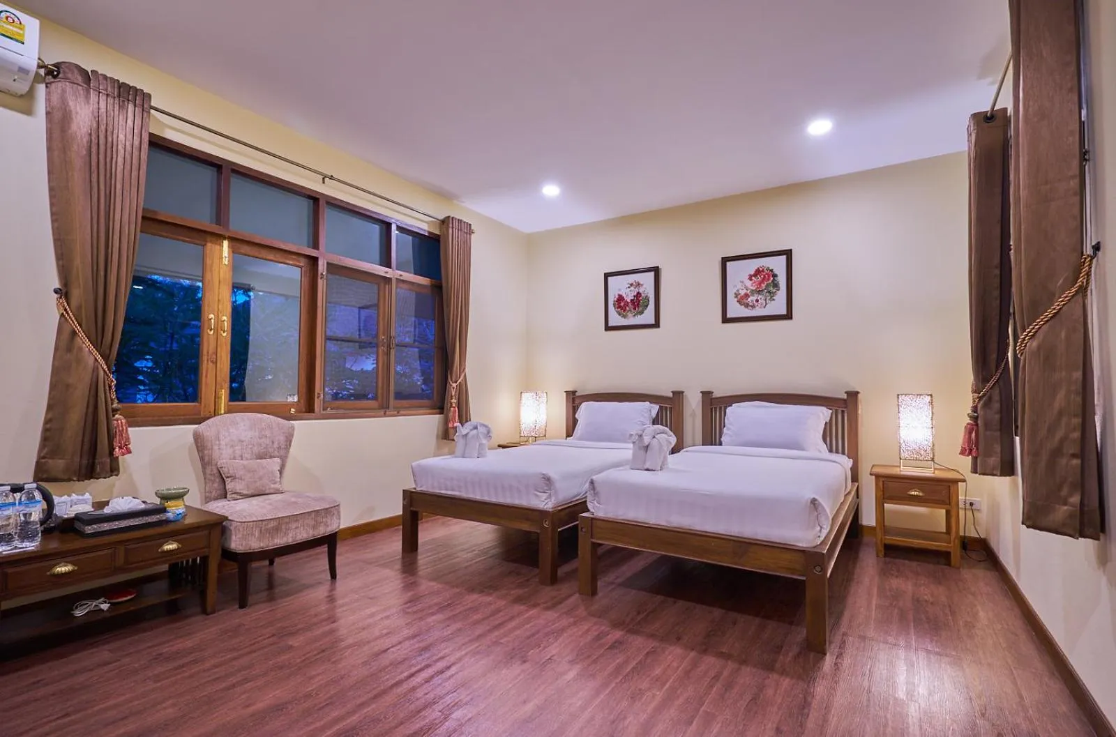 Bed in Mina Garden Villa Resort