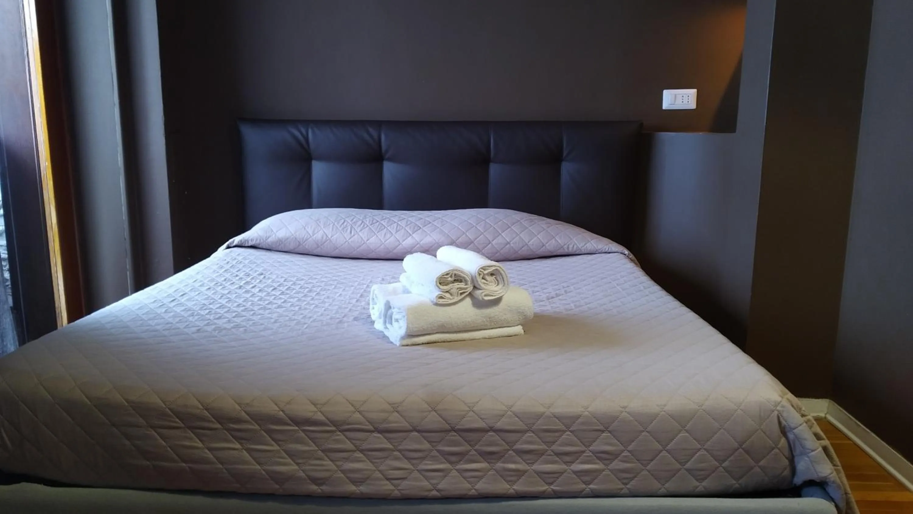 Bed in CconfortHotels R&B Dolci Emozioni