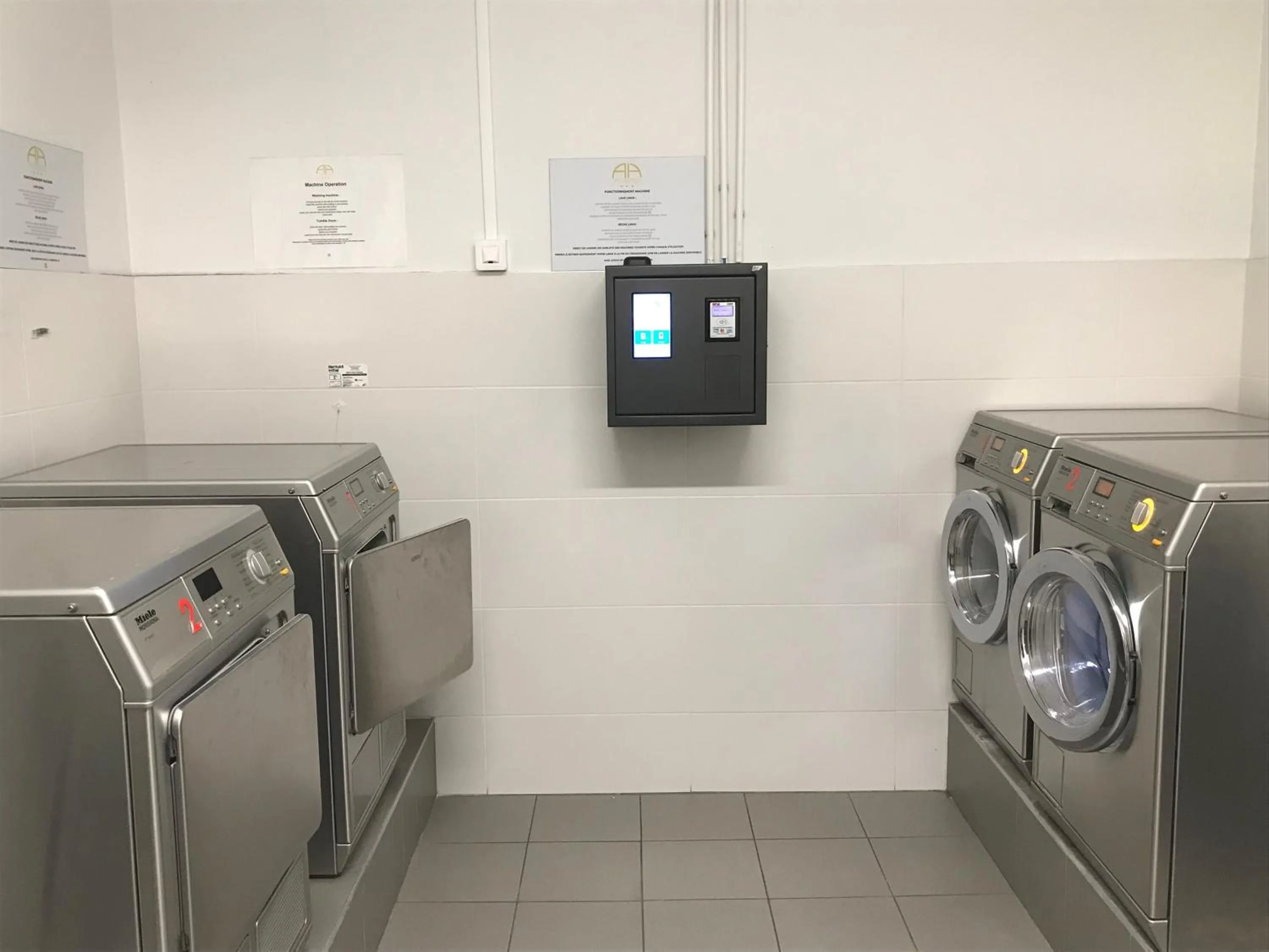 washing machine in All Suites Appart Hôtel - Palaiseau - Massy TGV