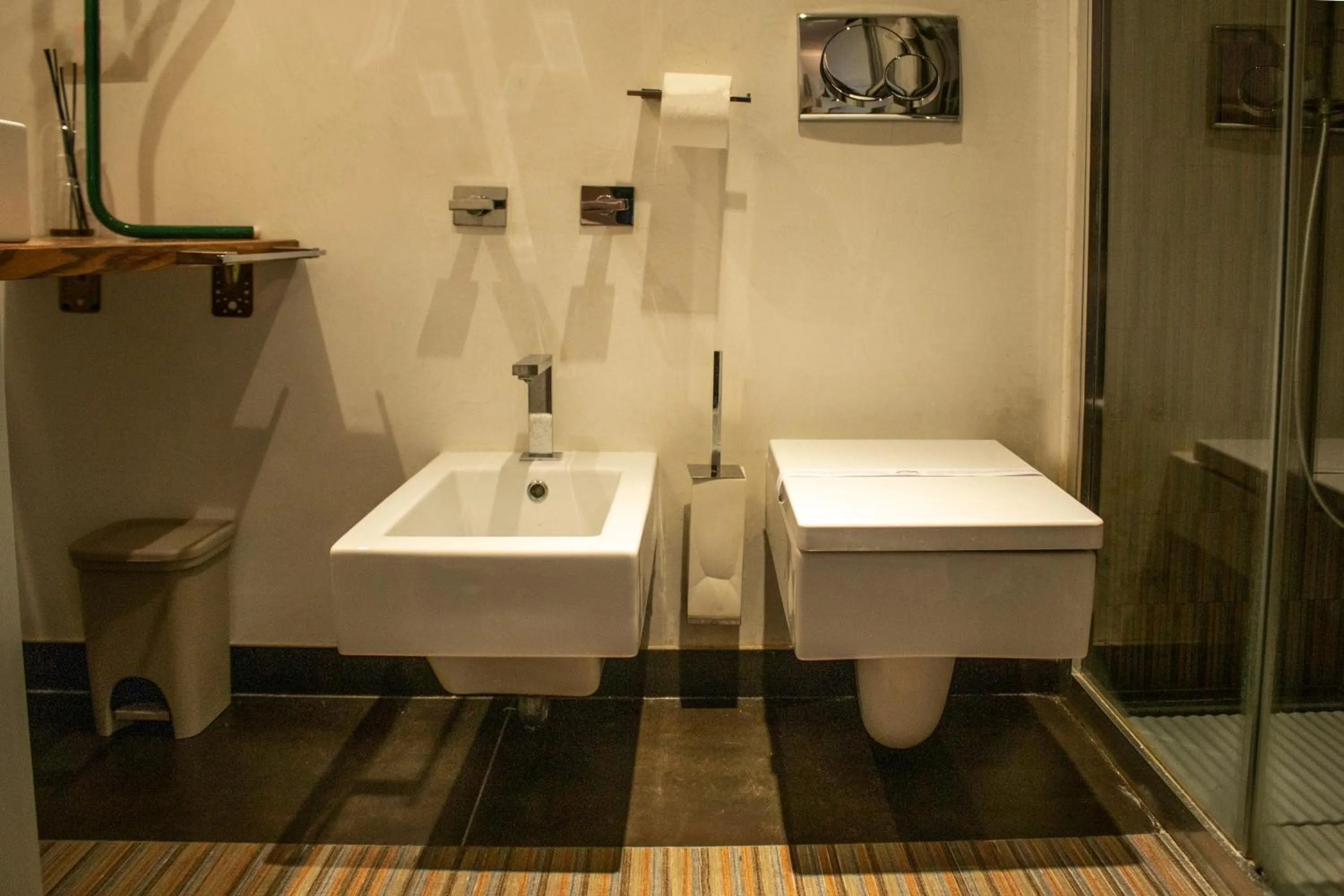Toilet in Apollo Suites