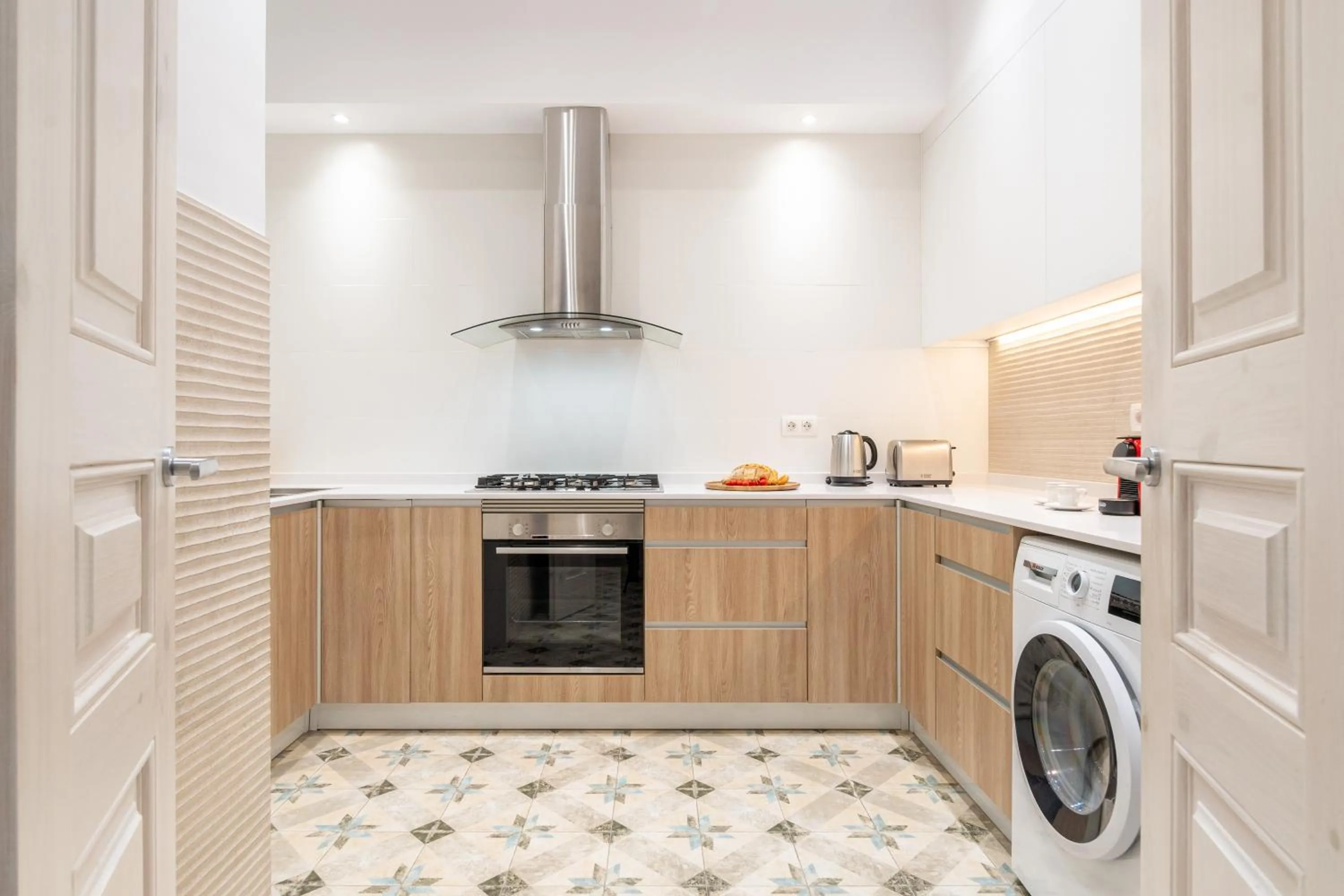 Kitchen or kitchenette in Fuster Apartments by Aspasios