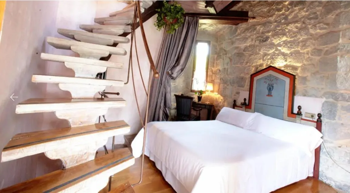 Bed in Hotel Castillo de Arteaga