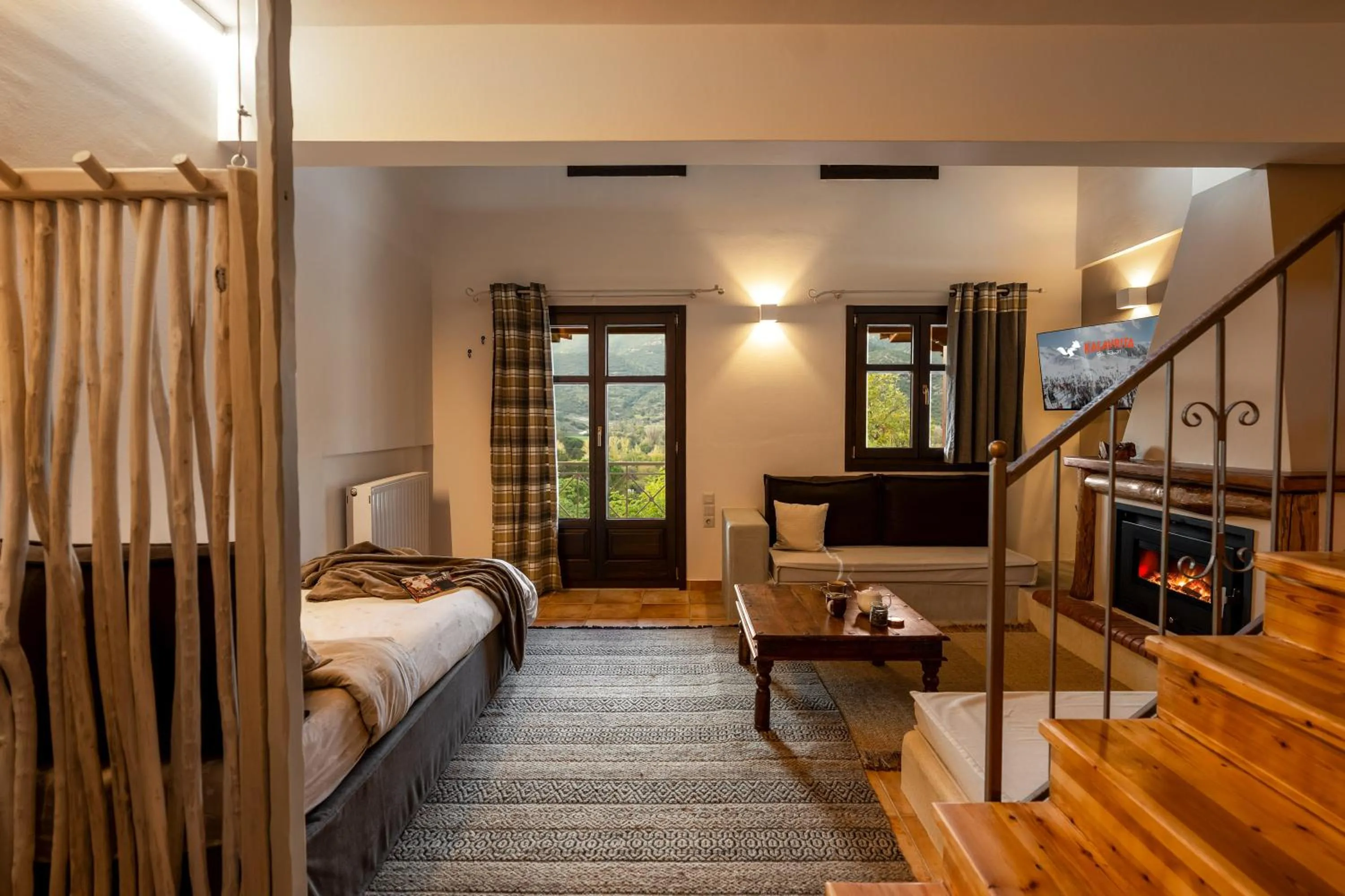 Living room, Bed in Kalavrita Botanica Hotel & SPA
