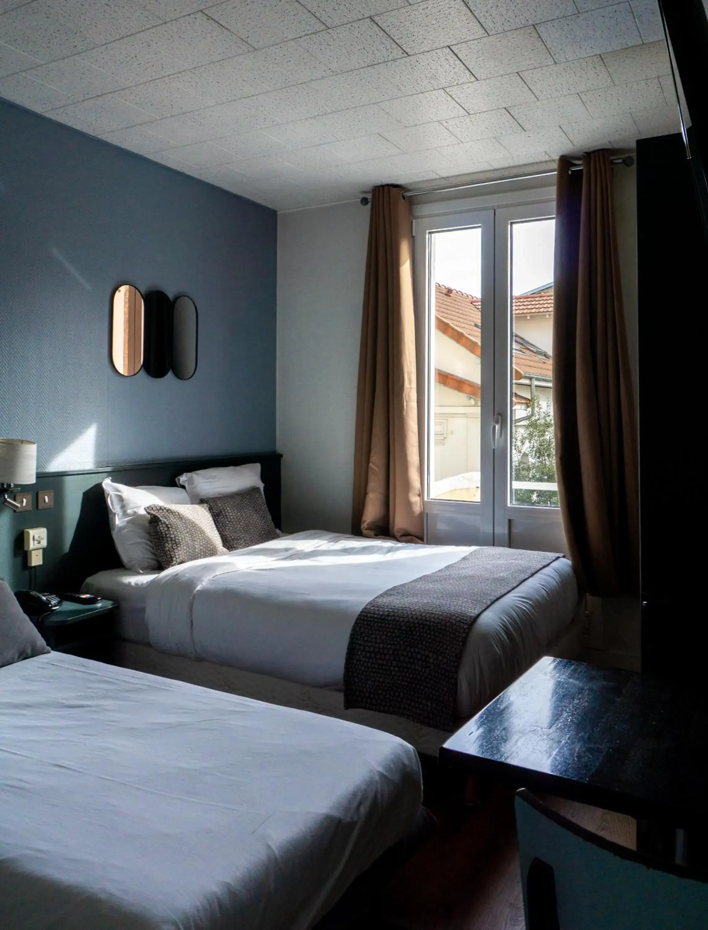 Twin Room in Hôtel du Parc Montsouris Twin Room in Hôtel du Parc Montsouris