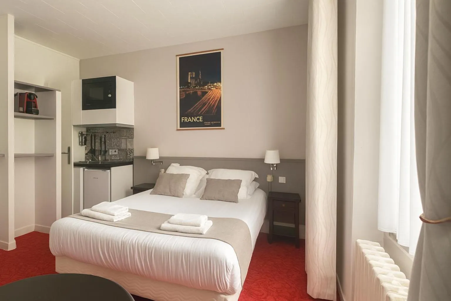 Bed in Hôtel du Parc Montsouris