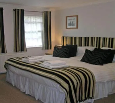 Bed in TOWNHOUSE ROOMS