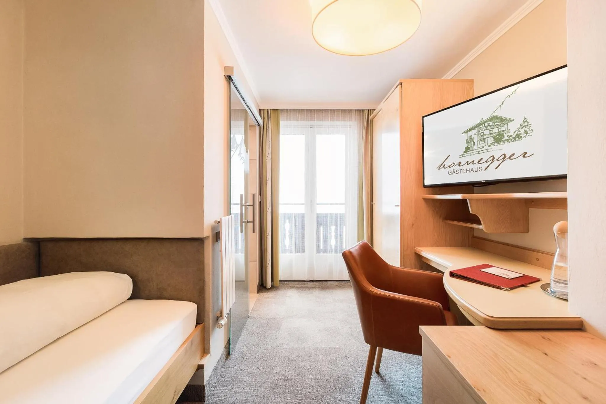Photo of the whole room, Bed in Gästehaus Hornegger