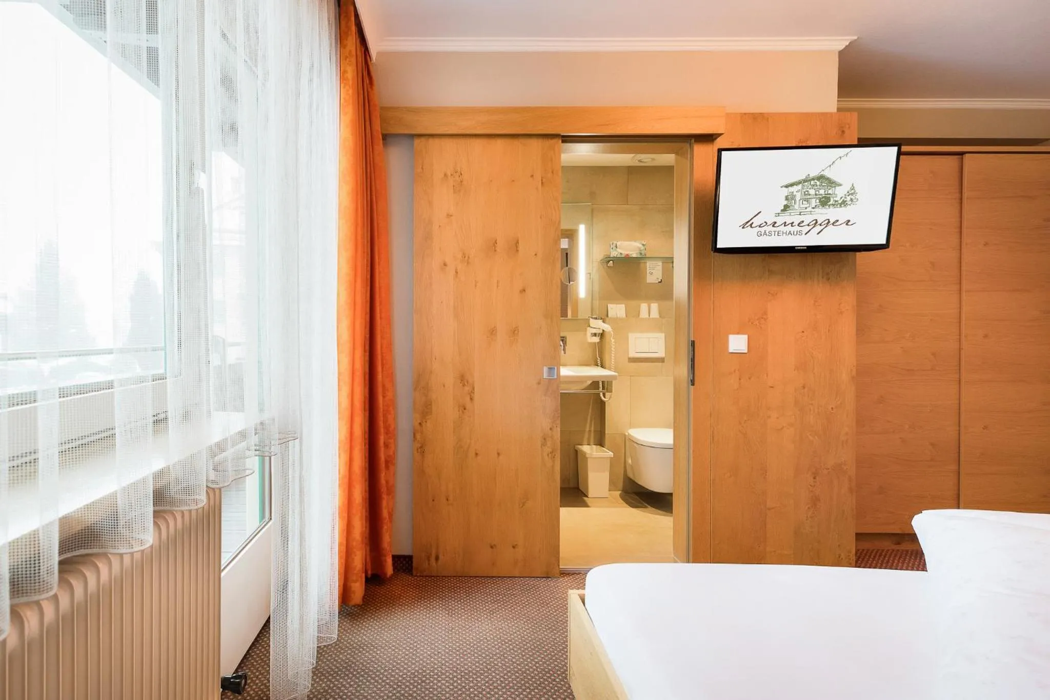 Photo of the whole room, Bed in Gästehaus Hornegger