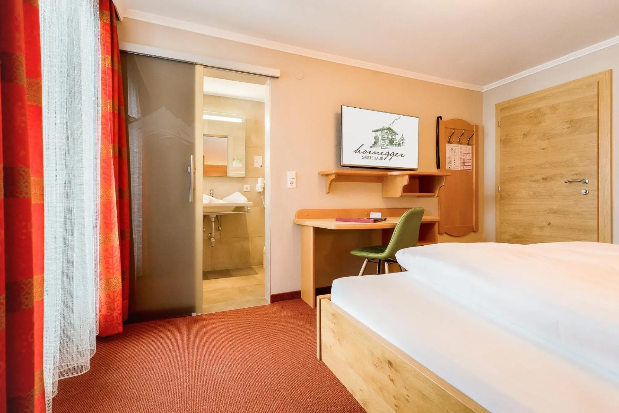 Photo of the whole room, Bed in Gästehaus Hornegger