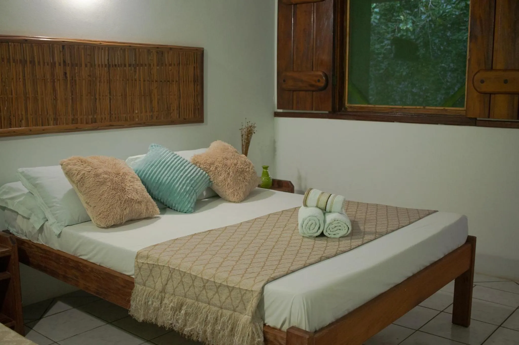 Bed in Pousada Lanai