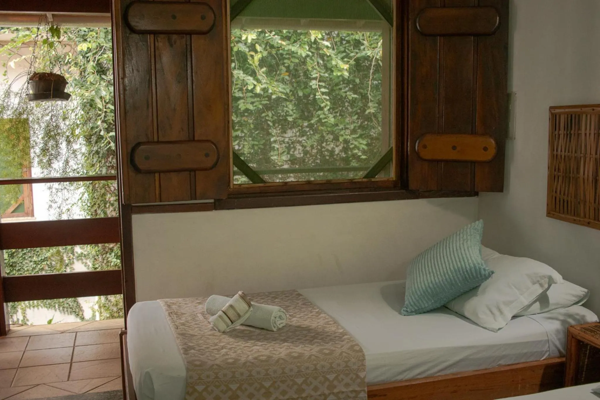 Bed in Pousada Lanai