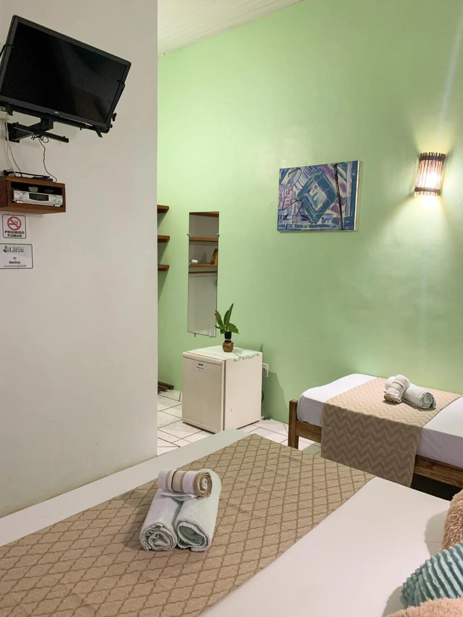 Bed in Pousada Lanai