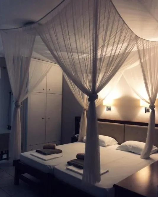 Bed in Calypso Beach Hotel