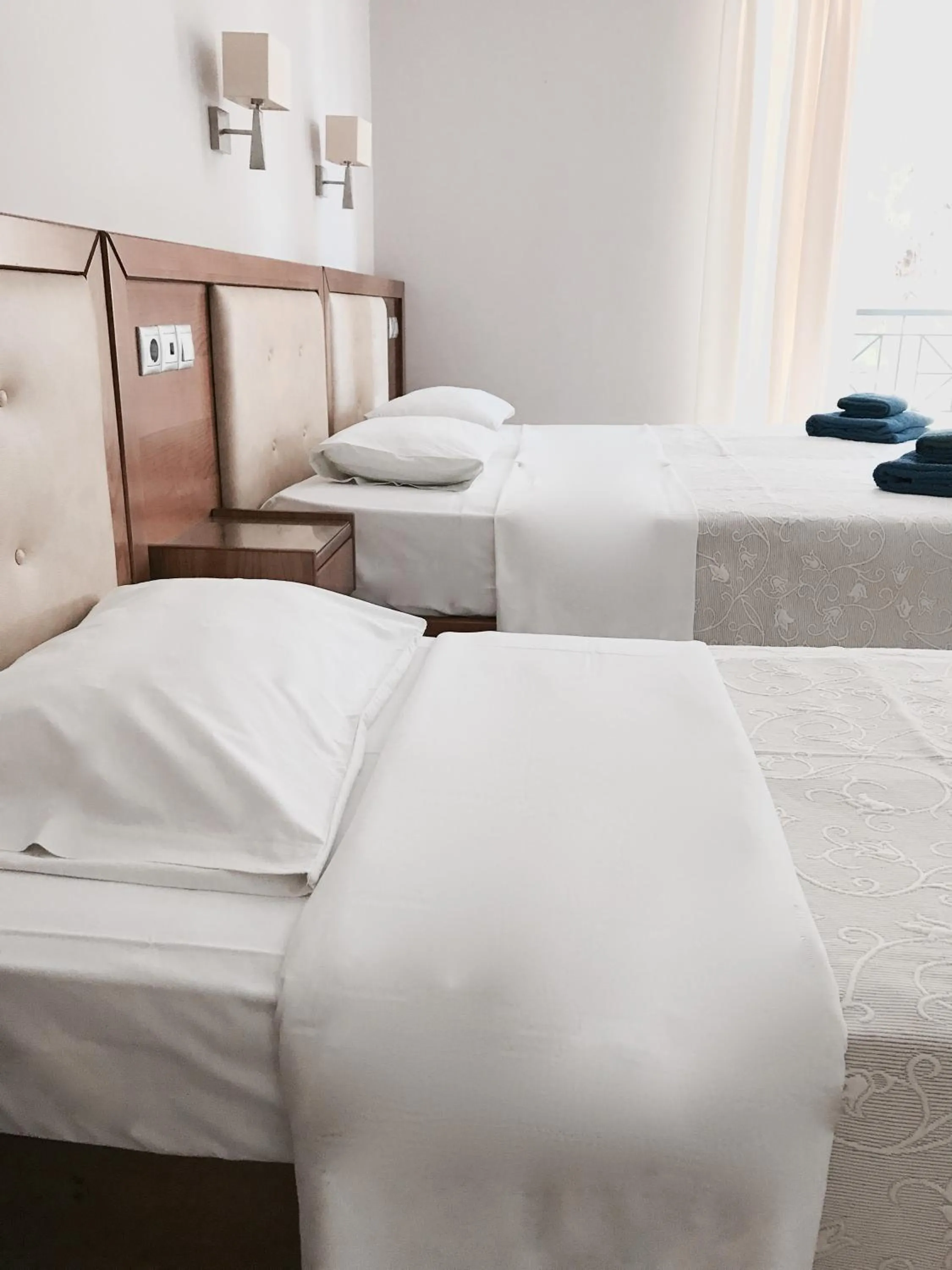 Bed in Calypso Beach Hotel