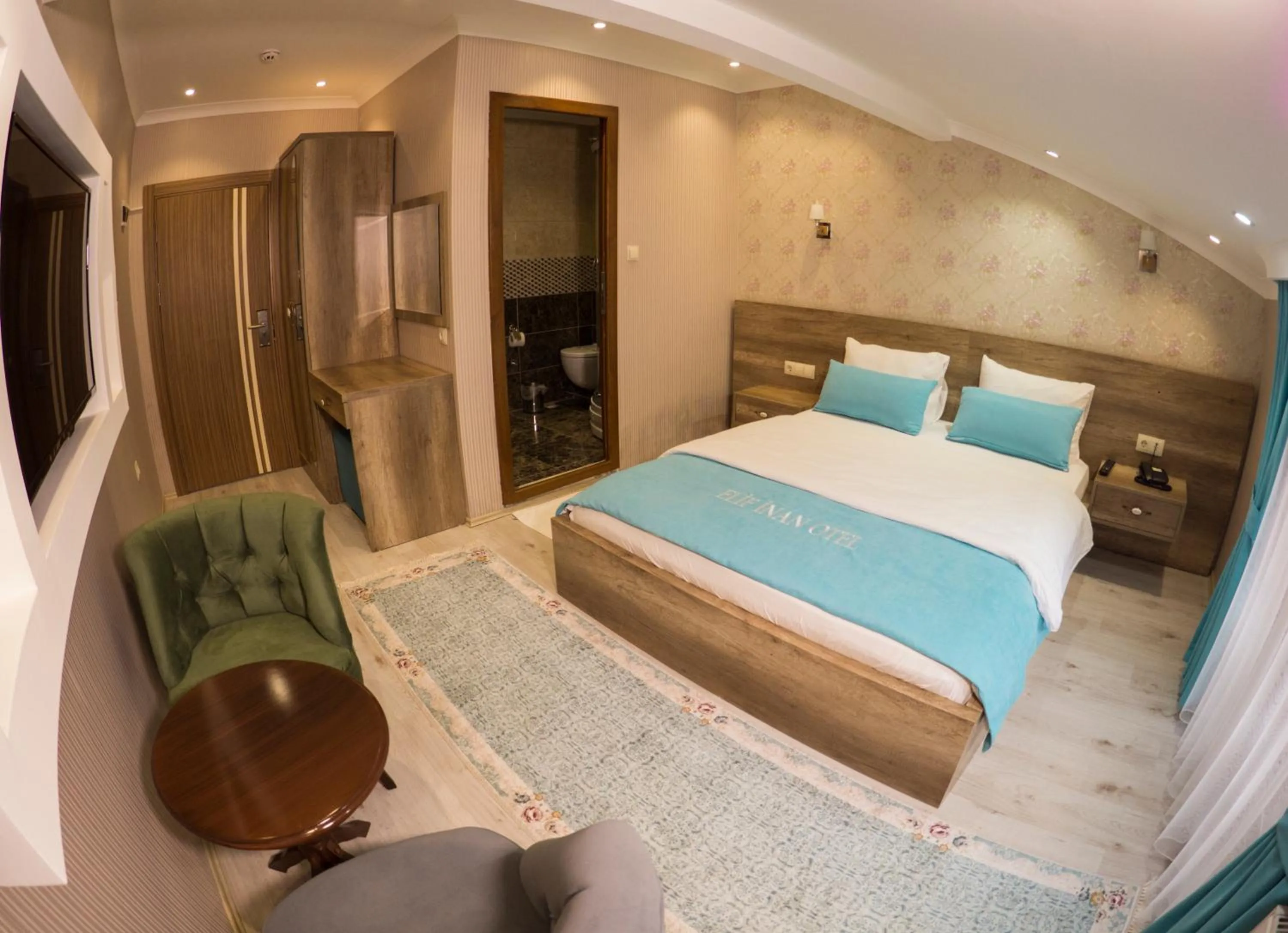 Bed in Elif Inan Hotel