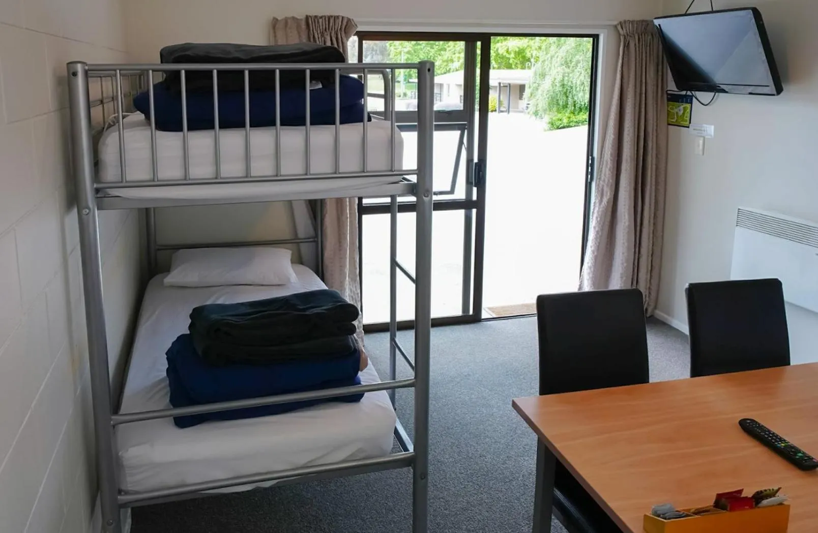 Bed in Mt Aspiring Holiday Park